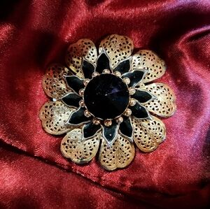 Vintage Gold Tone Broochwith Center Blace Ravoli stone. 2 Inches